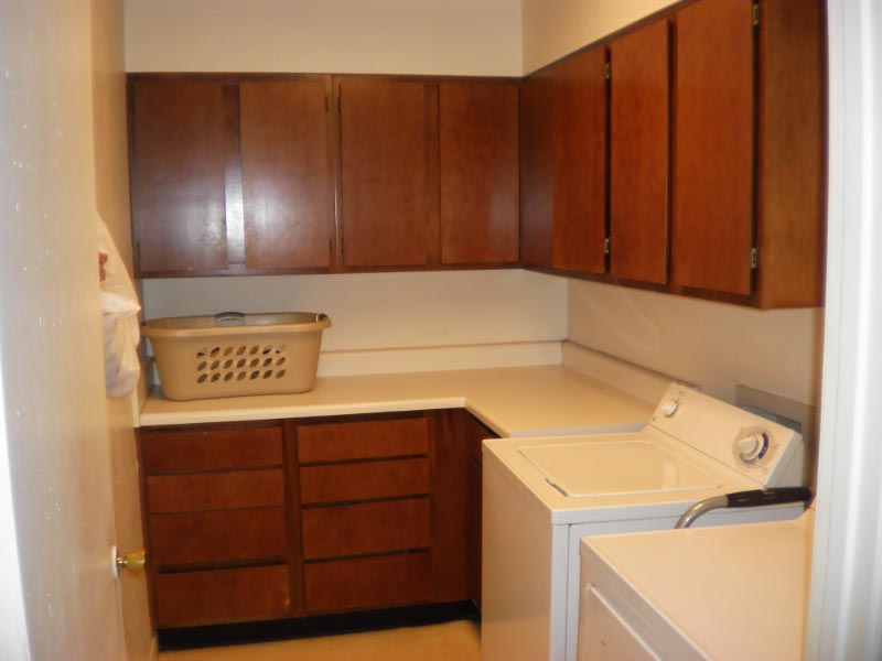 Separate Laundry Room with Storage
