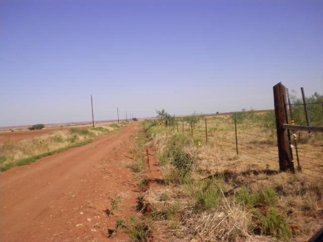 County road at entrance to farm